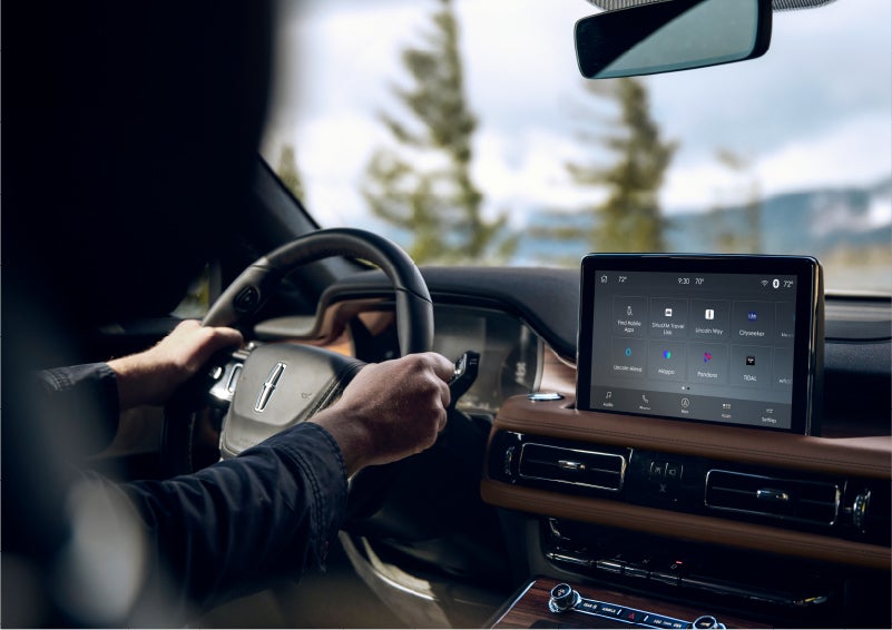The Lincoln+Alexa app screen is displayed in the center screen of a 2023 Lincoln Aviator® Grand Touring SUV | Bayway Lincoln in Houston TX